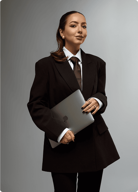 Shelby Sapp seated in a black blazer